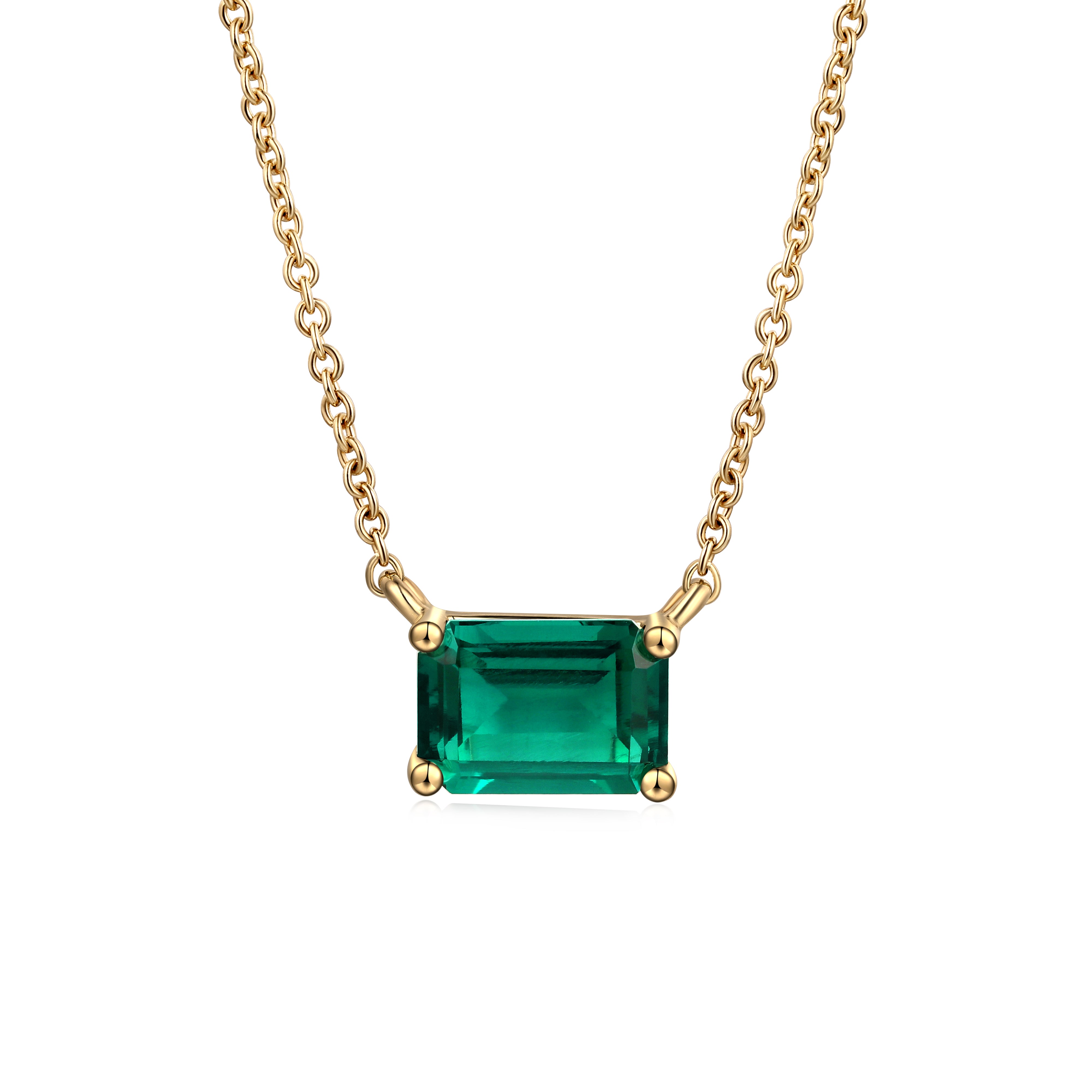 lab emerald necklace in 10 karat yellow gold 