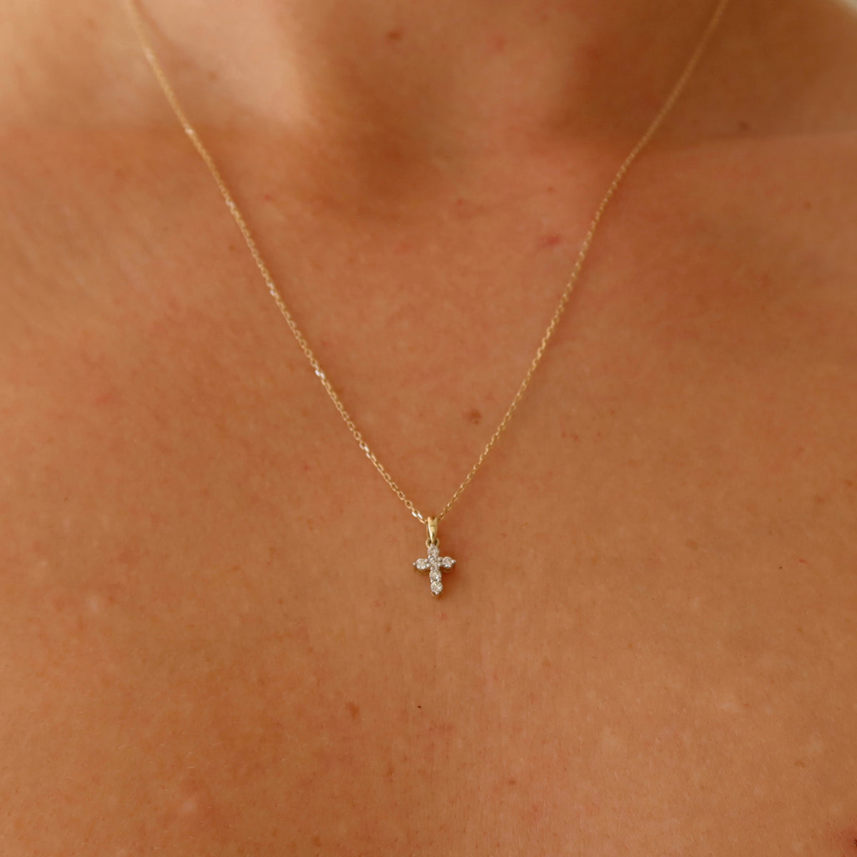 dainty 9 karat yellow gold oval link chain with mini diamond cross pendant 