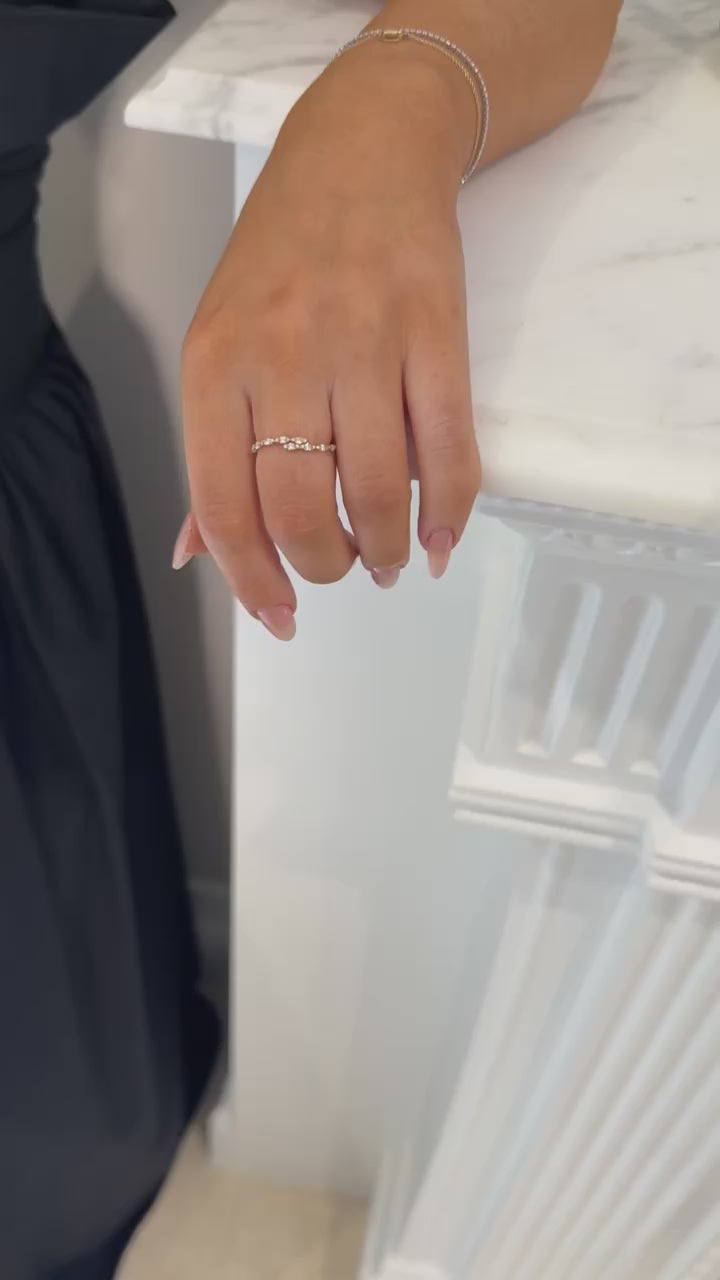 10 karat yellow gold wrap ring with white sapphire stones