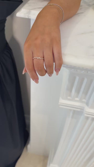 10 karat yellow gold wrap ring with white sapphire stones
